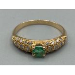 Ladies 18ct yellow gold emerald and diamond ring size Q 2.6g gross