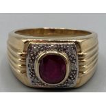 Gents 9ct yellow gold ruby and white stone ring size U 10.3g gross