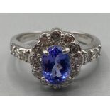 Ladies 14ct white gold tanzanite and diamond cluster ring size N 4.7g gross
