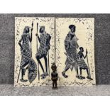 Pair of Batik wall art depicting African figures together with a West African carved wooden figure