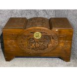 Heavily carved Asian camphor wood chest, 102x51x58cm