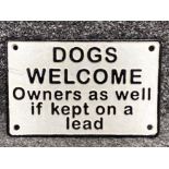 Cast metal novelty sign “Dogs welcome, owners as well if kept on a lead”