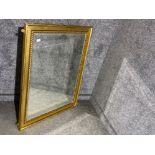 Gilt framed bevelled glass mirror width 91cm length 107cm