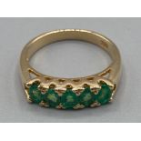 Ladies 18ct yellow gold and emerald five stone ring size L 3.8g gross