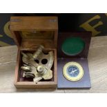 Antique brass sextant in wooden box together with a vintage compass
