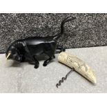 Heavy metal fighting bull ornament together with a vintage corkscrew with resin scrimshaw design