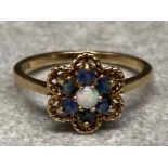 9ct yellow gold Opal & blue stone ring, ring comprises of central Opal surrounded by 6 blue