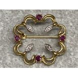 9ct yellow & white gold brooch set with four rubies, 2.4g