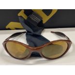 Pair of Oakley sunglasses with brown frames & lenses, includes carry pouch