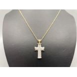 Ladies 9ct white gold and diamond set crucifix on 9ct gold chain (24.5cm long) 5.5g gross