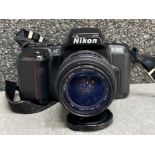 Nikon F-601 camera with Hoya 52mm skylight lens