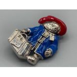 A sliver and enamel paddington bear brooch, 11.0g