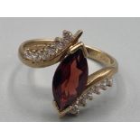 Ladies 9ct yellow gold garnet and CZ ring size N 2.9g gross