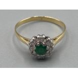 Ladies 18ct yellow gold emerald and diamond cluster ring size M 2g gross