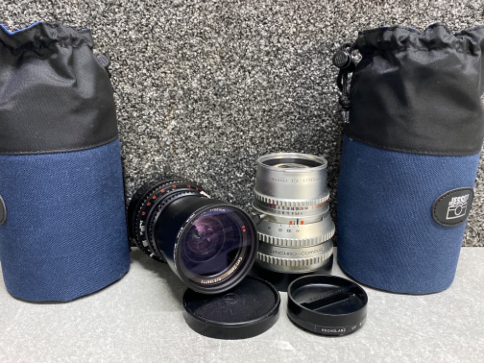 2x Hasselblad lenses includes - Carl Zeiss distagon 1:4 f=50mm & Carl Zeiss sonnar 1:4 f=150mm, both