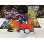 A selection of Pokémon card Albums & storage tin (cards not included)
