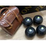 Set of 4 Tyrolite lawn bowls with Slazenger bag