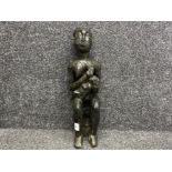 An African Iron Wood Hand carved figure of a mother & child 19.5”