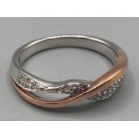 Ladies 9ct rose and white gold crossover diamond ring size Q 3.8g gross
