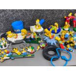 Box containing a large quantity of “the Simpsons” figures, key rings & novelty bath plugs etc