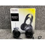 Boxed Sony wireless comfort head phones together with Sony Cyber-shot Lens G & Carl Zeiss Vario-