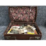 Brown leather WW2 evacuation case containing miscellaneous vintage children’s books & old postcards