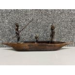 Hand carved African ferry boat with 3x carved figures, length 44cm