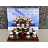 The first Royal Doulton Thimble collection on display stand (12 in total, different patterns)