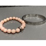 Thomas Sabo charm bracelet with rose Quartz beads & silver logo together with a Michael Kors stylish