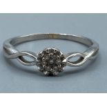 9K white gold & diamond ring - size R1/2, 1.9g gross