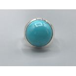 A silver and turquoise ring size p1/2 6.23g gross