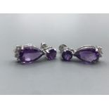 A pair of silver substantial pear shaped amethyst drop earrings 7.48g gross