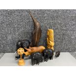 Collection of hand carved African wood carved animal ornaments including Rhinoceros, Elephants &