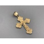 Brand new ex-display 14ct yellow gold cross pendant 1.6g