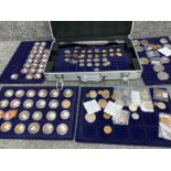 Case containing a large quantity of miscellaneous coins, to include commemorative, old pennies,