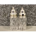 Antique pair of silver topped glass sugar/condiment bottles, hallmarked London