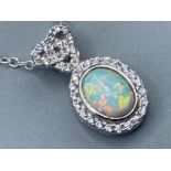 A silver CZ and Opal panelled pendant necklace, 4g gross