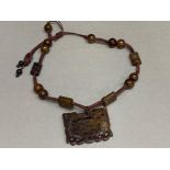Vintage brown beaded jade pendant necklace