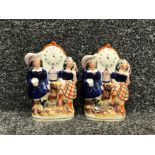 A pair of antique Staffordshire clock group figures