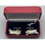 A pair of silver pig cufflinks, cased, 8.2g