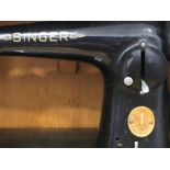 Vintage singer sewing machine in original carry