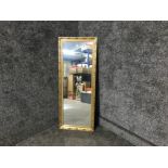 Ornate gilt framed wall mirror