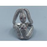 A silver CZ double snake ring with Ruby eyes, size N, 8.4g gross