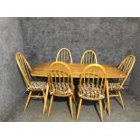 Blonde Ercol dining table and 6 Windsor back chairs 152cm x 73cm