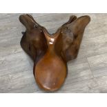 Vintage brown leather horse saddle