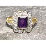 Ladies 18ct gold amethyst and diamond cluster ring. 5.1g Size O
