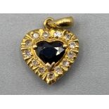 18ct gold diamond & sapphire heart shaped pendant 1.3G gross