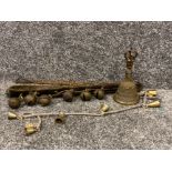 A fine cast bronze bell bearing vertical ring handle, face and surmounted by a crown together with