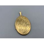 Large vintage 9ct gold engraved oval locket 11.2g