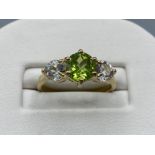 Brand new ex-display 10cy yellow gold green and white stone set ring, size N 2.6g